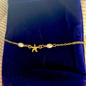 Gold colored anklet